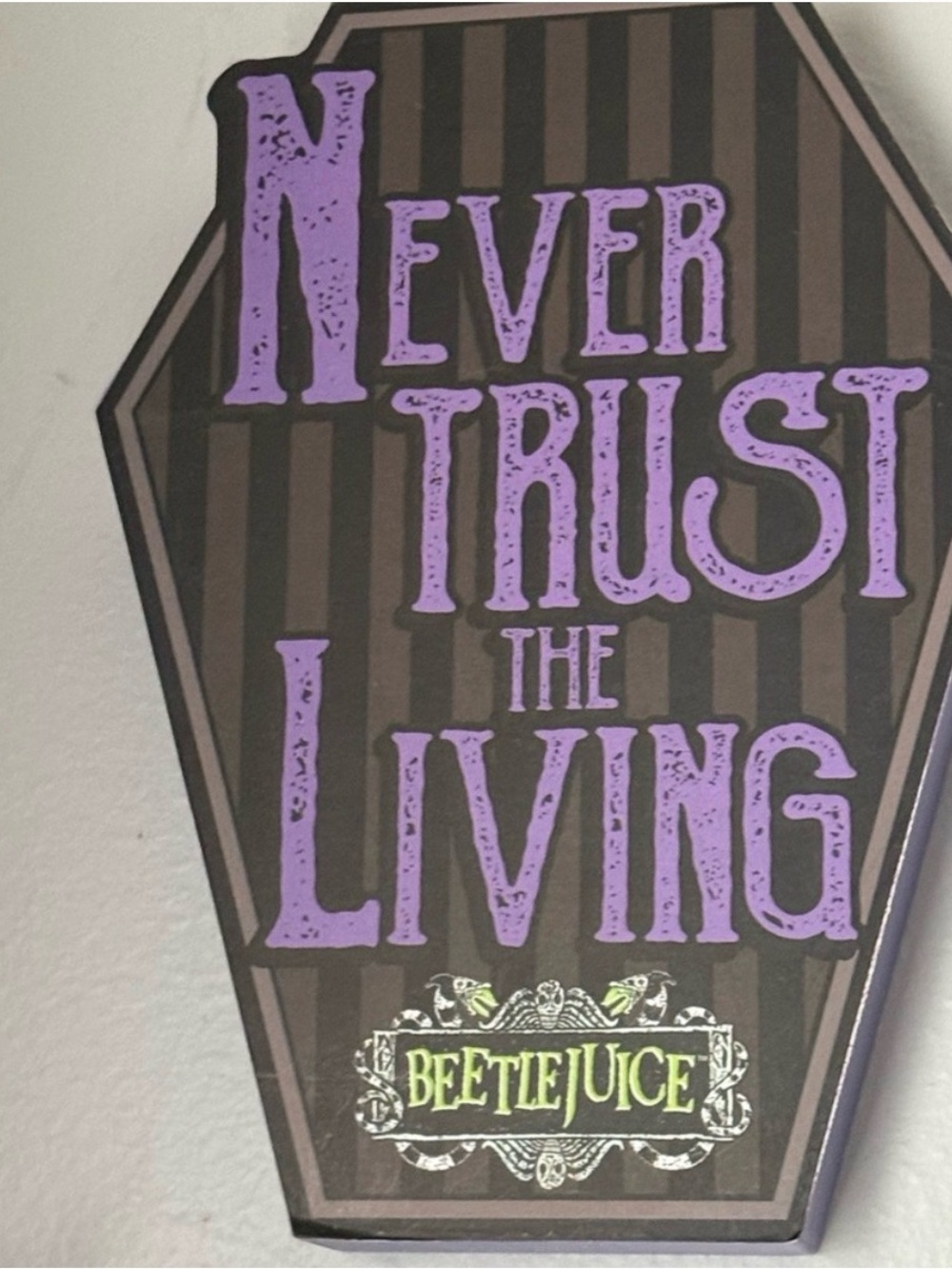 Beetlejuice "Never Trust The Living" Coffin Sign - Purple & Black